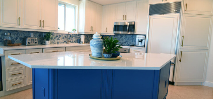 New blue cabinets installed on a kitchen island