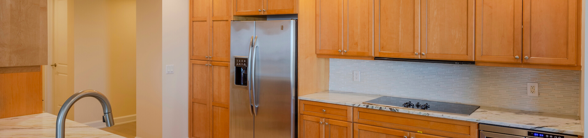 Photo of kitchen with old cabinets before refinishing