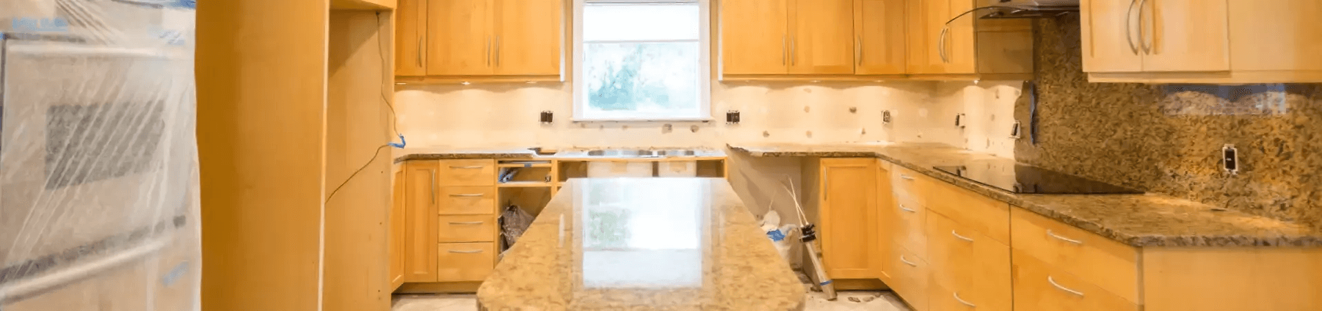 Photo of kitchen with old cabinets before refinishing