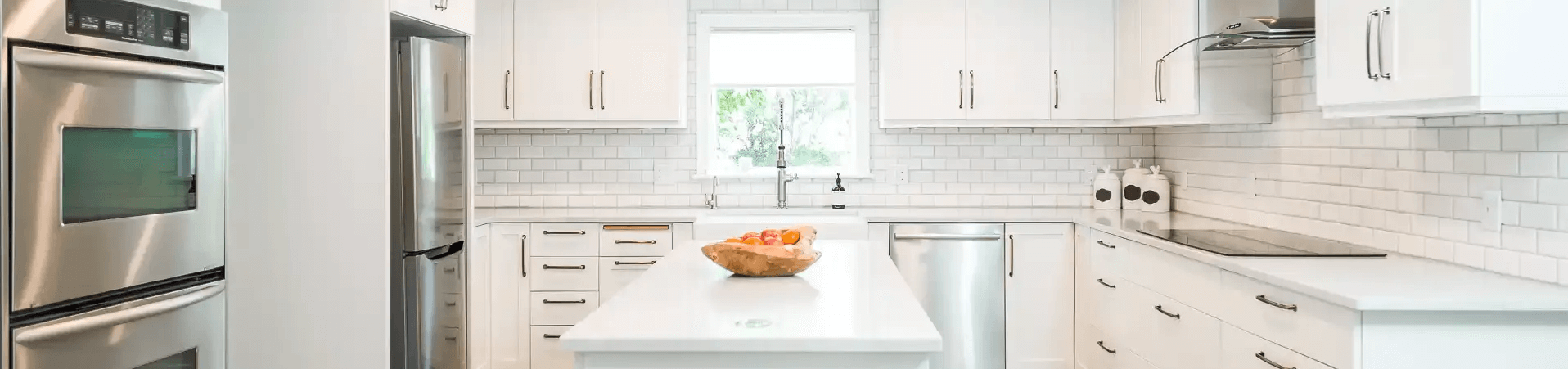 Photo of kitchen with blue and white refinished cabinets