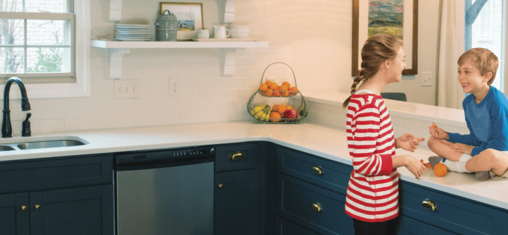 kids in painted kitchen