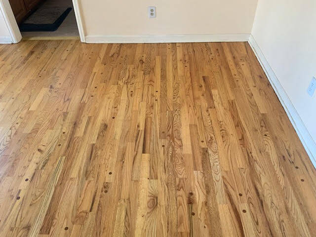 heavily damaged hardwood floor restoration