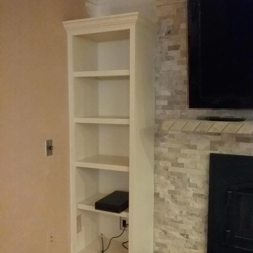 painting built in bookcase