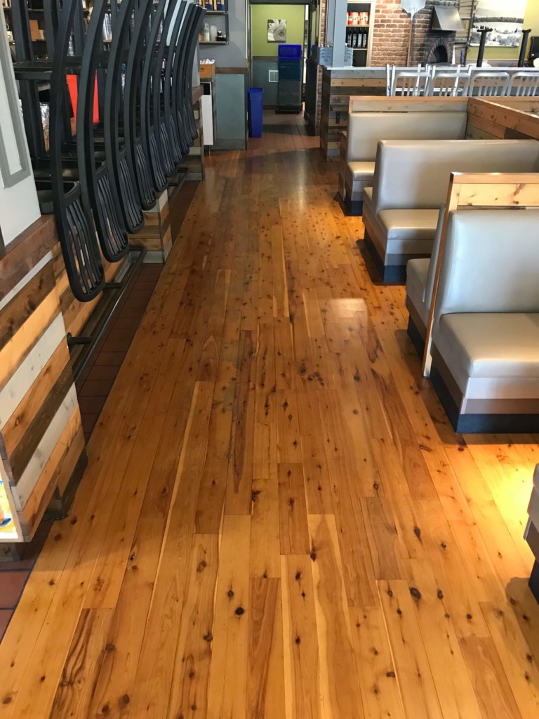 worn hardwood floor restoration restaurant
