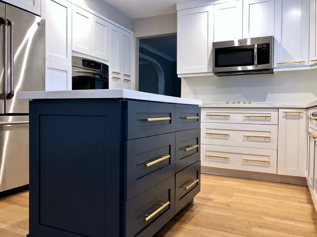 two-tone kitchen with accent color island