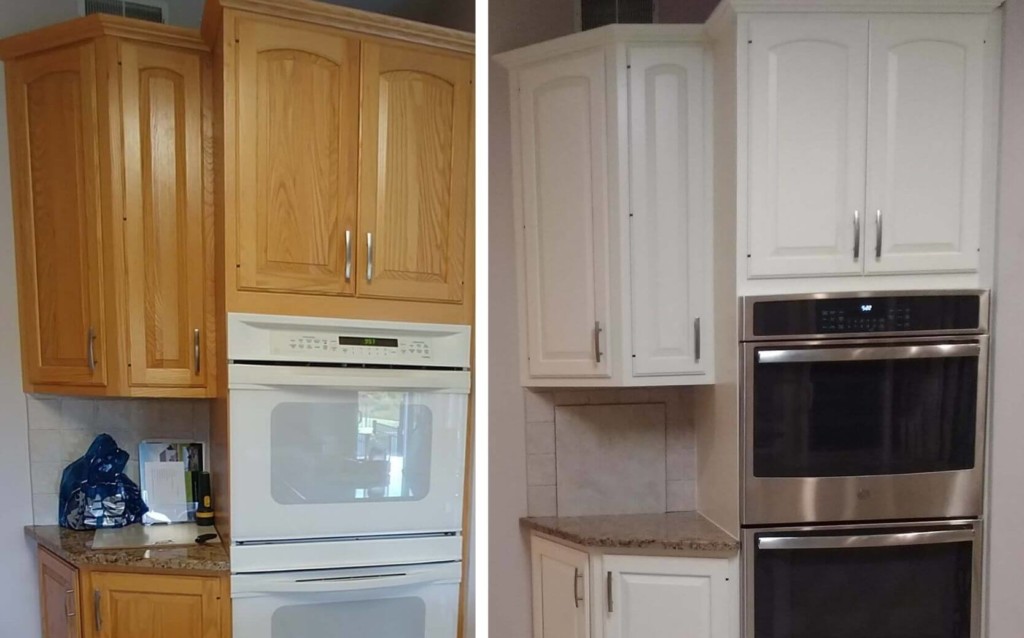 Old wood cabinets above oven repainted white