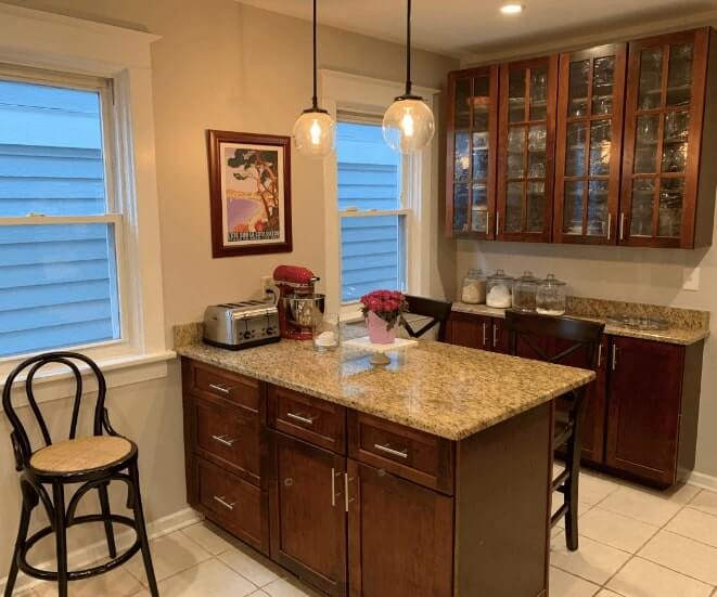 Dark wood cabinets and island