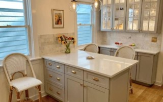Light gray cabinets and island