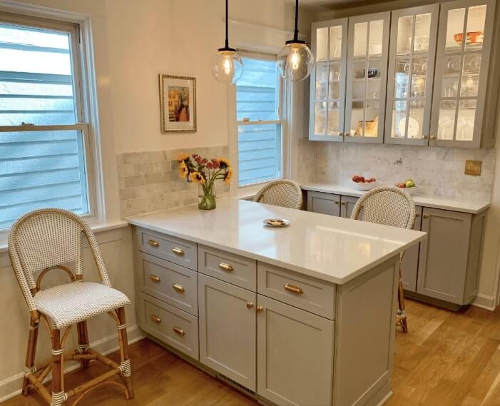 Light gray cabinets and island