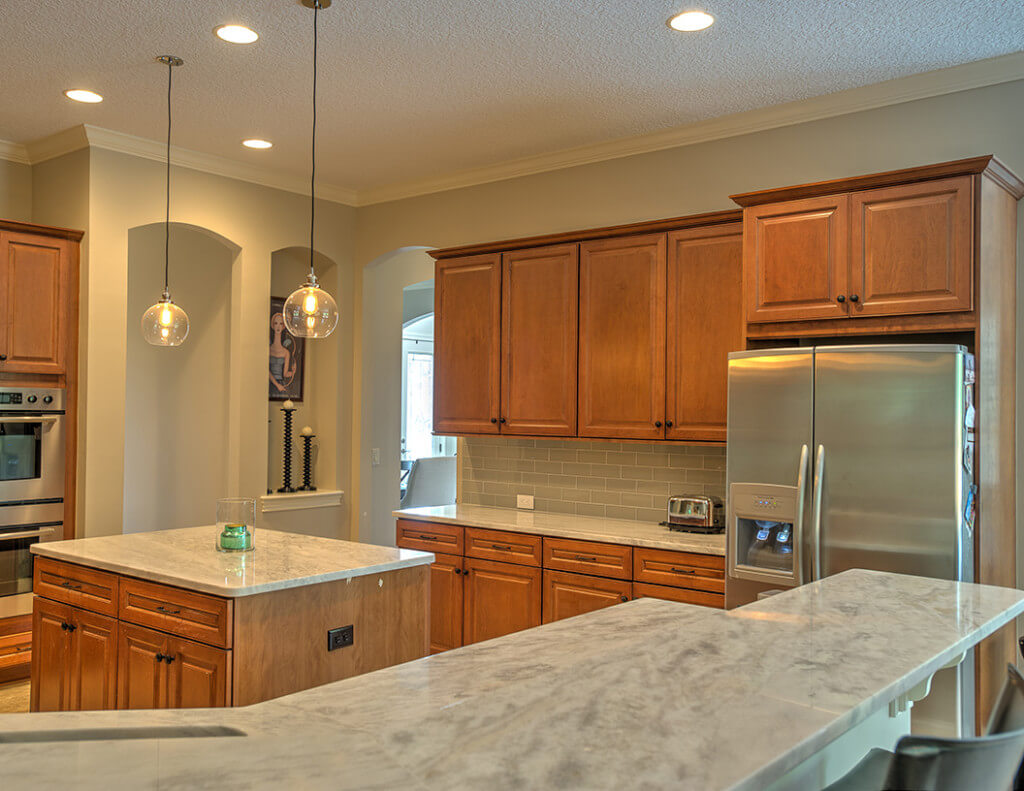 lighter brown cabinets in a kitchen