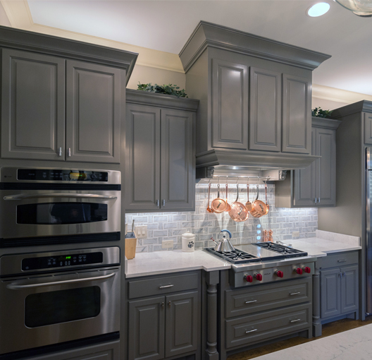 dark gray cabinets in a kitchen after painting