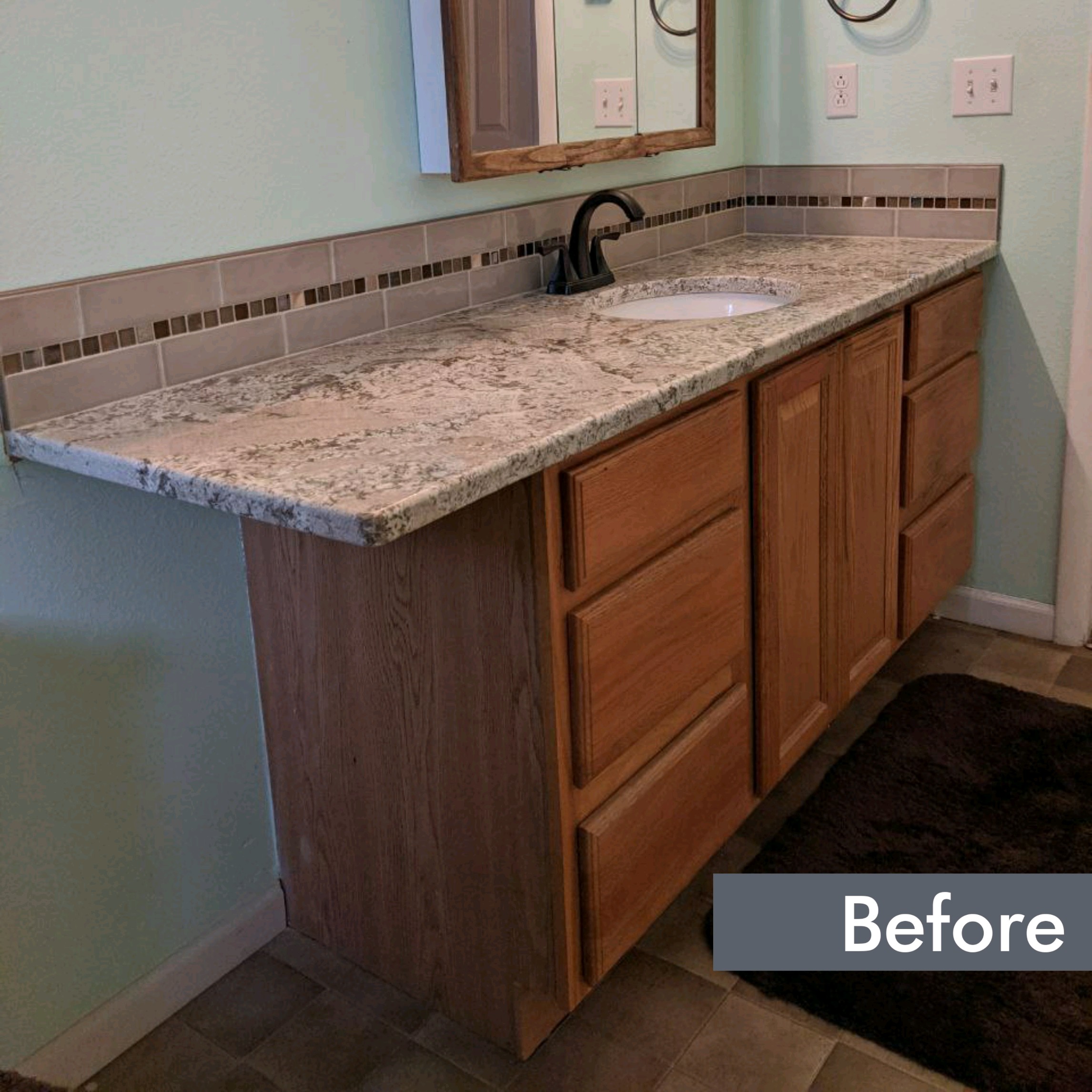 Before-Before and after of a cabinet door replacement project in a Boise bathroom