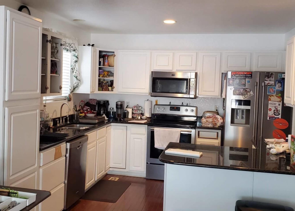 Touched up white kitchen cabinets before denver