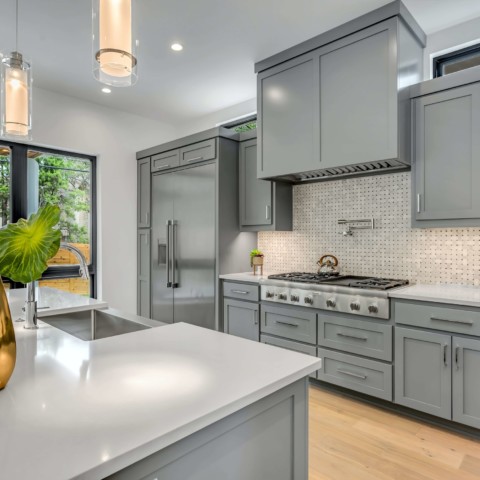grey-cabinets-with-silver-hardware