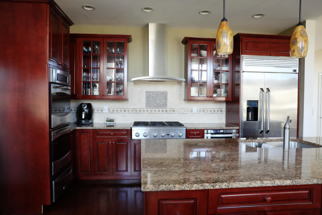 Cherry kitchen cabinets before cabinet refinishing 