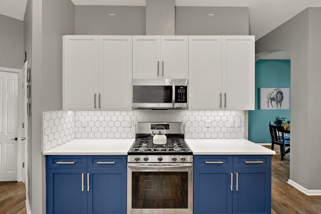 blue and white kitchen cabinets after replacement