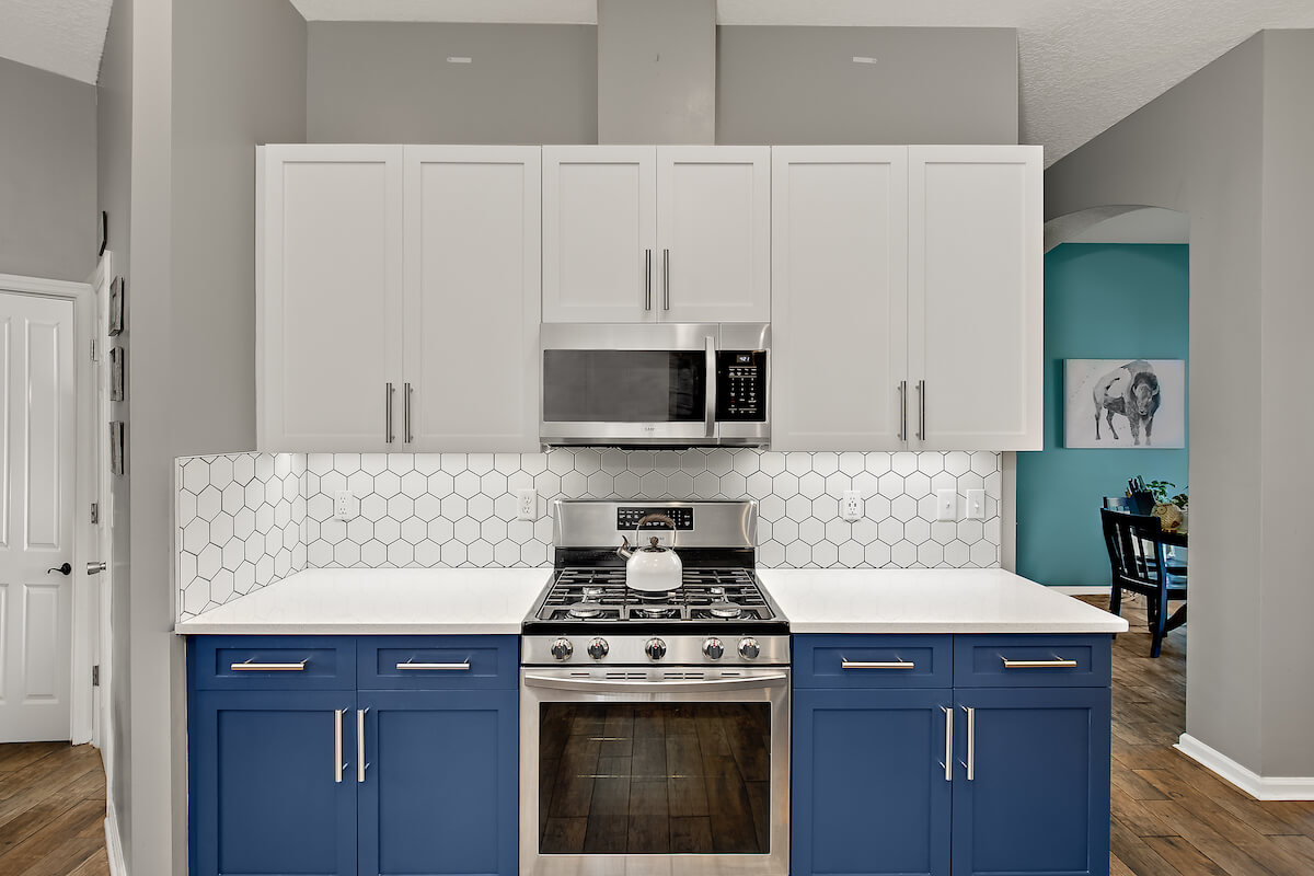 After-Outdated cabinets to two tone shaker style