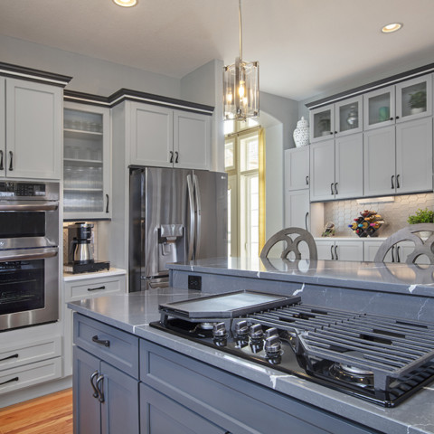 gray and navy kitchen cabinet painting