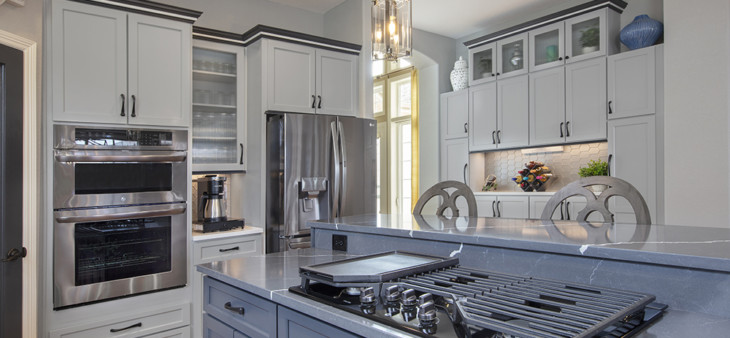 gray and navy kitchen cabinet painting