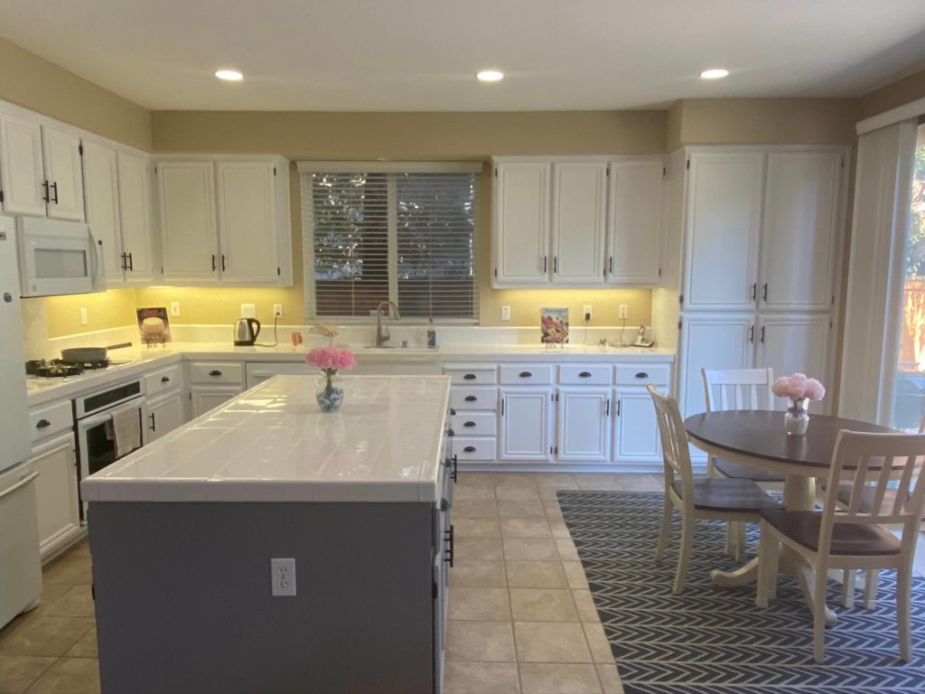 white cabinets in a kitchen after painting