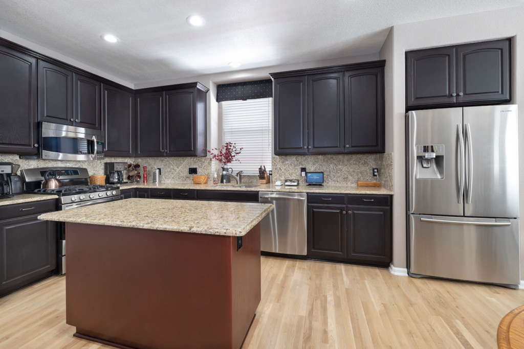 dark cabinets in a kitchen after staining