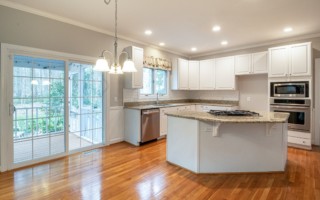 kitchen with white, painted cabinets