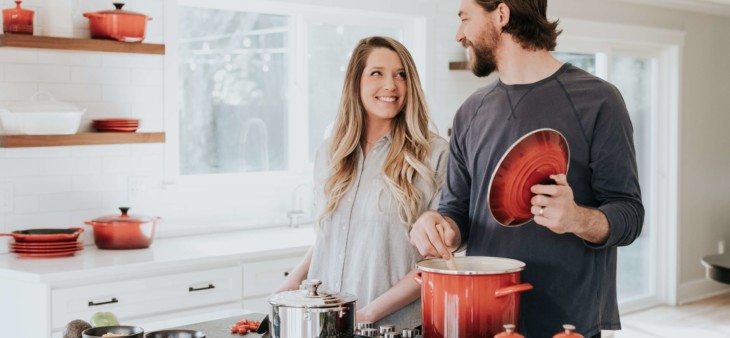 family cooking in kitchen