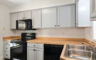 kitchen with grey painted cabinets