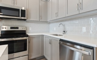 kitchen with light grey cabinets