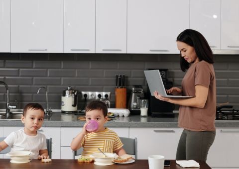 mom in kitchen with two kids