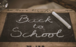 back to school written on chalkboard