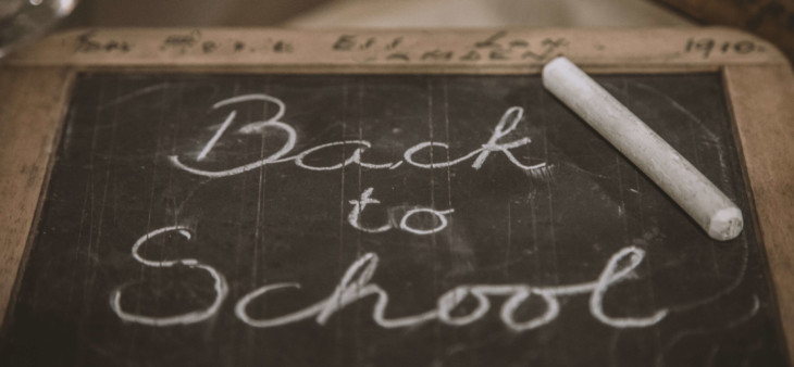 back to school written on chalkboard