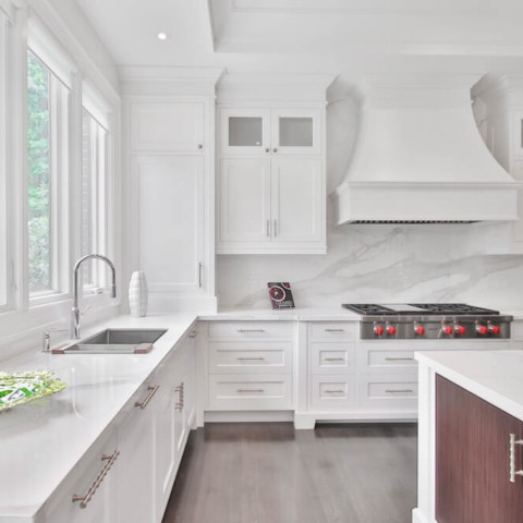 modern kitchen with white cabinets