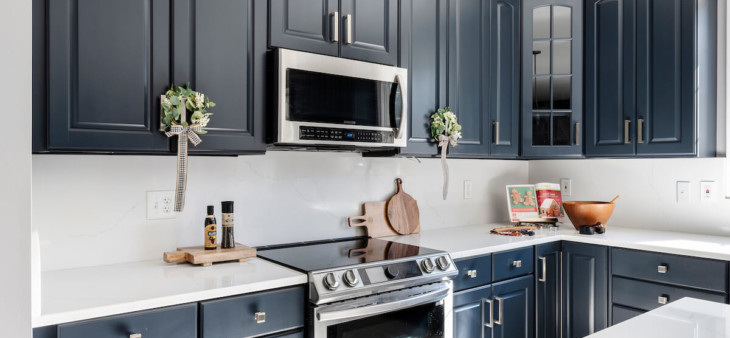 kitchen with dark grey cabinets