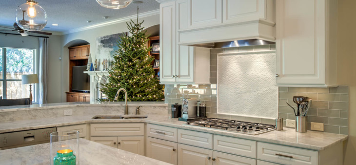 white kitchen cabinets in a kitchen next to a christmas tree in solano county