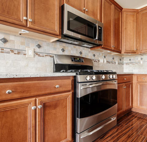 Before-wood to white cabinets