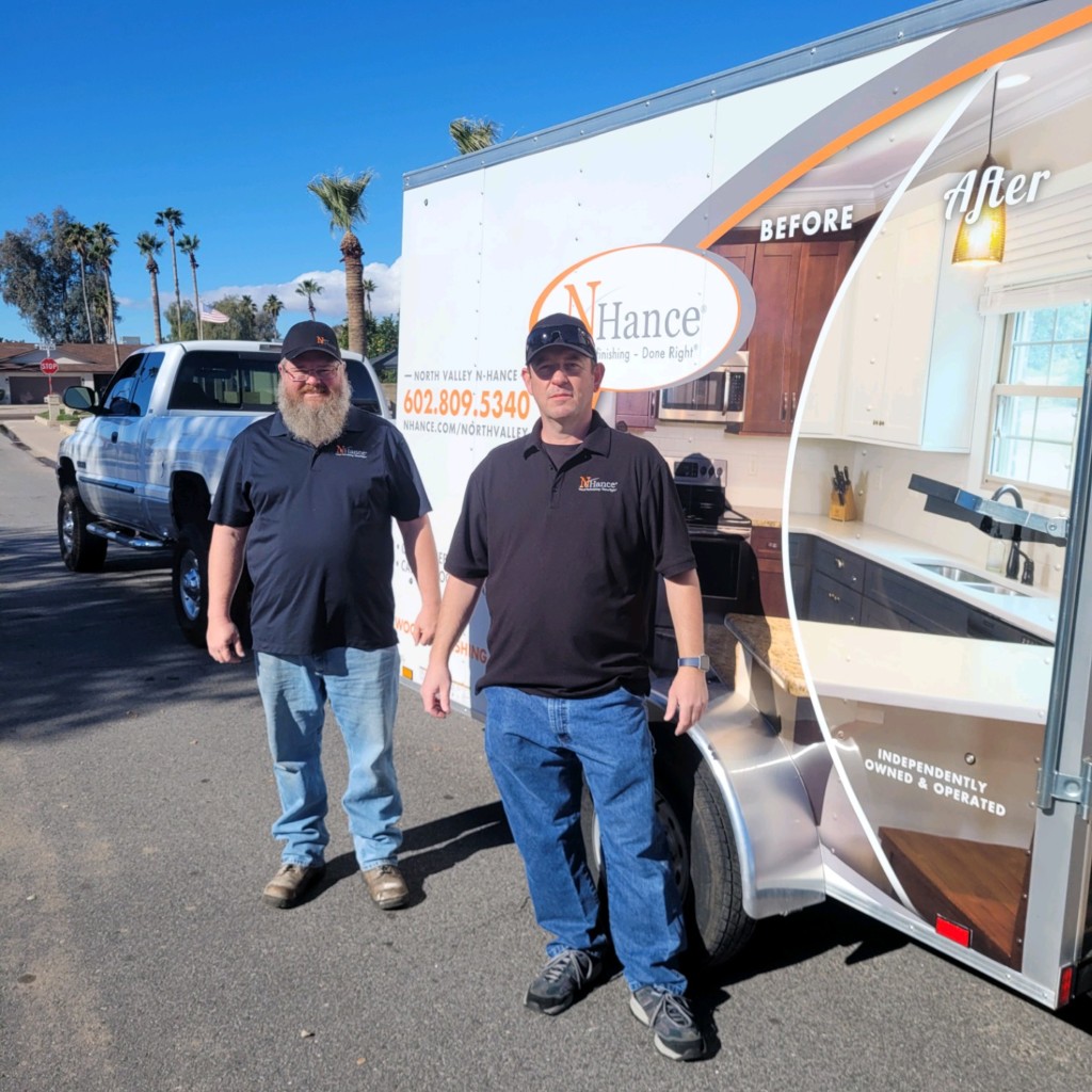 n-hance of north valley owners, john and paul, standing with company trailer and vehicle