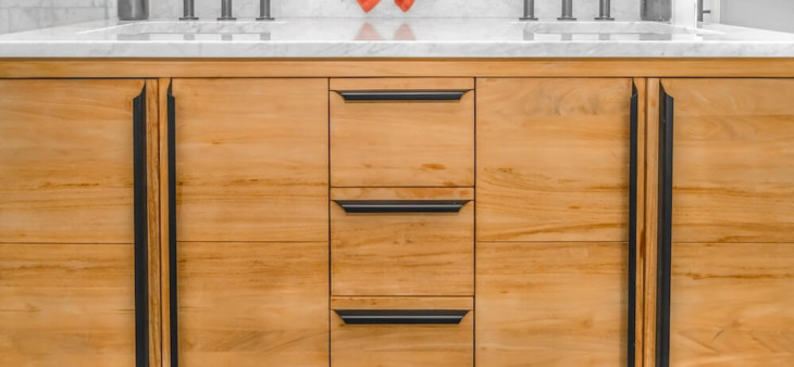 modern bathroom with brown wooden cabinets