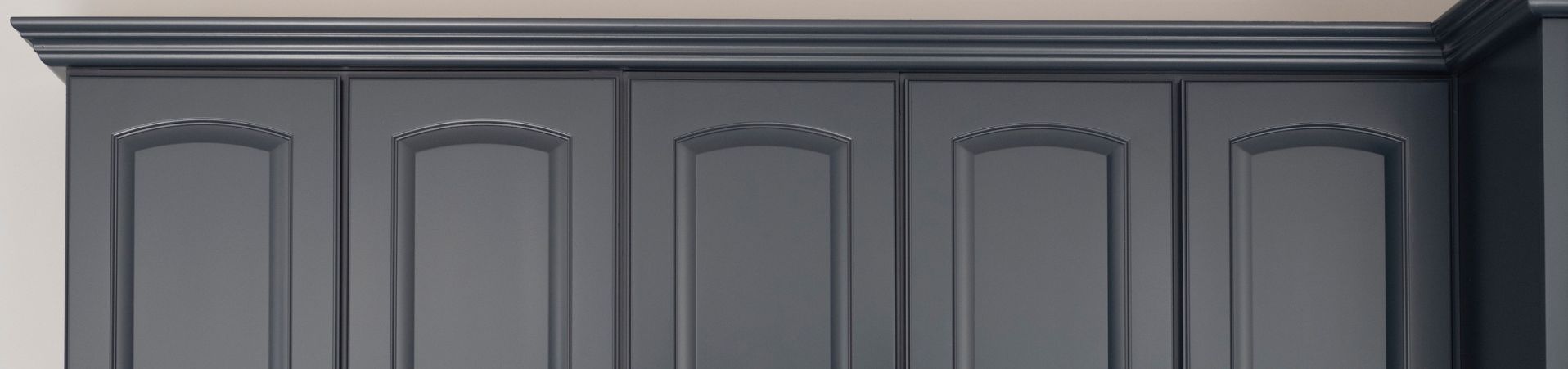 Photo of kitchen with blue and white refinished cabinets