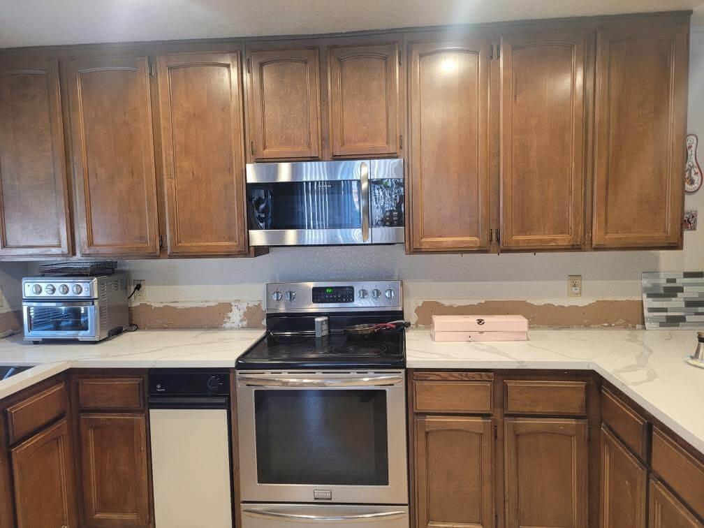 brown cabinets in a kitchen before refacing