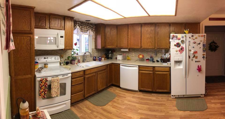 before apartment kitchen cabinet refinishing after