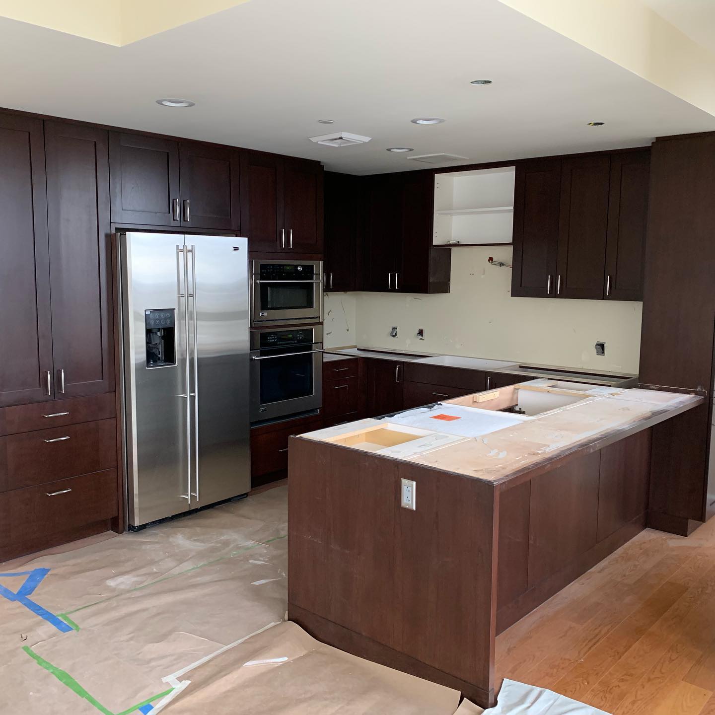 before open floor to ceiling kitchen cabinet replacement