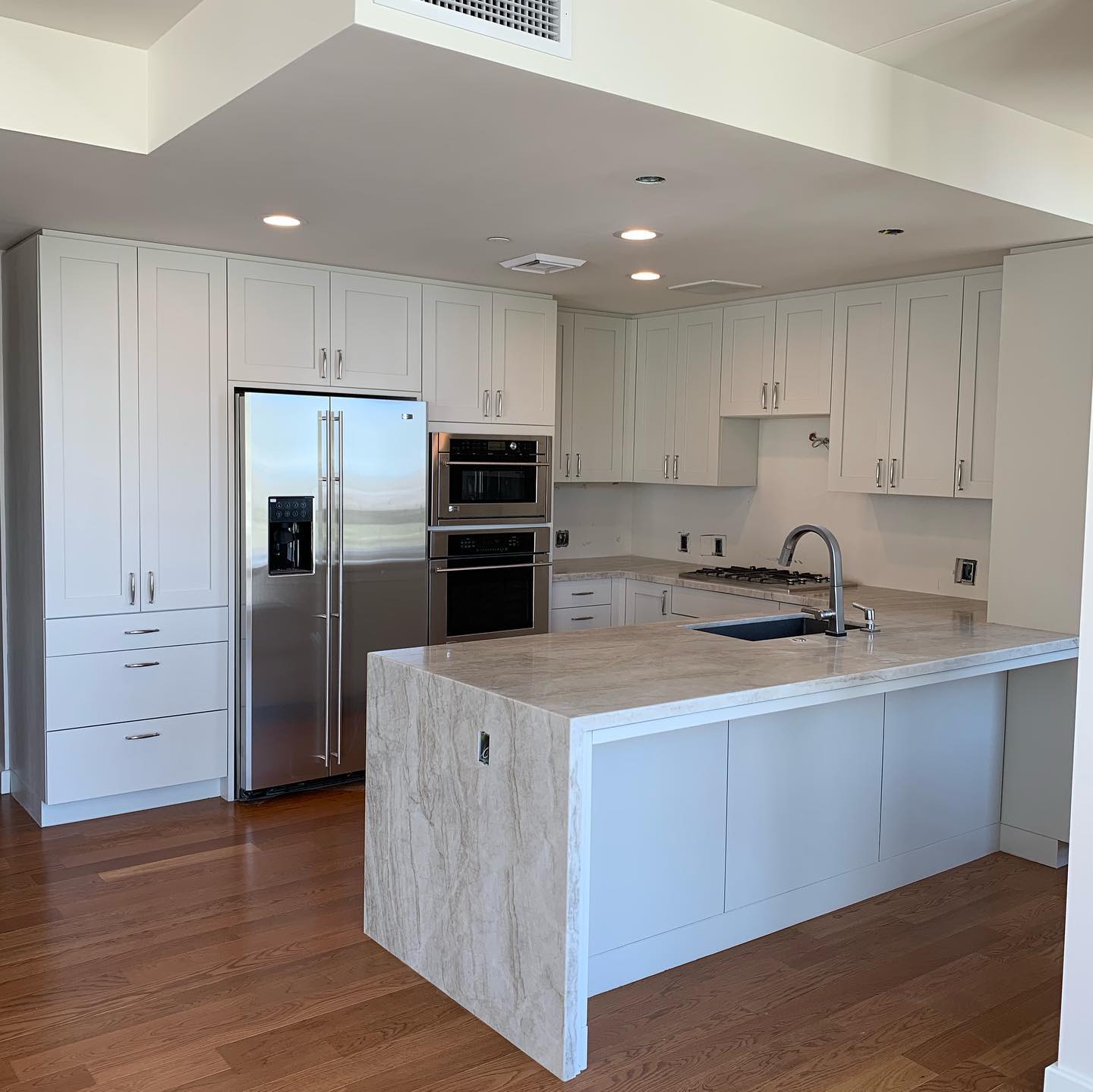 after open floor to ceiling kitchen cabinet replacement