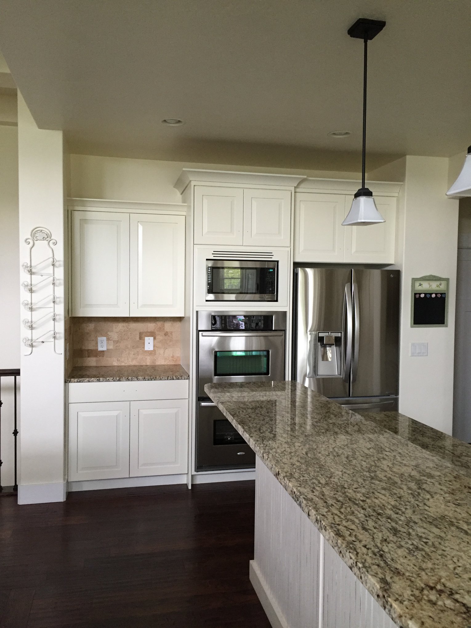 white oven and fridge kitchen cabinet refinishing