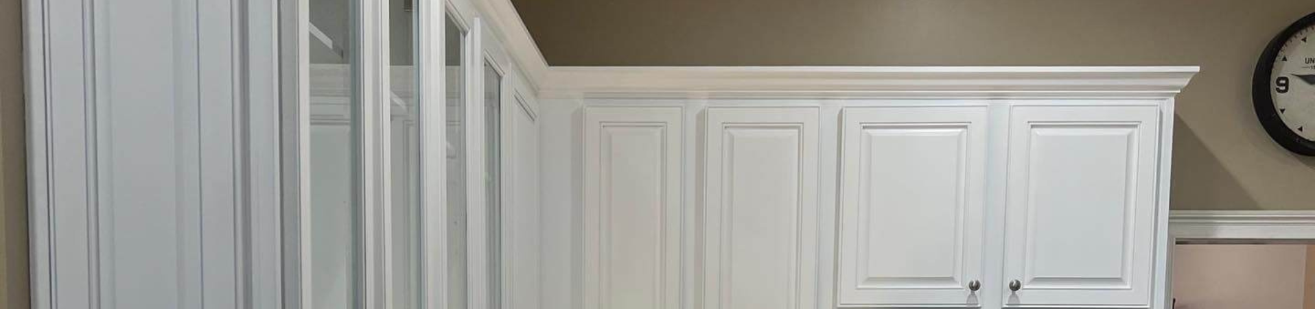 Photo of kitchen with blue and white refinished cabinets