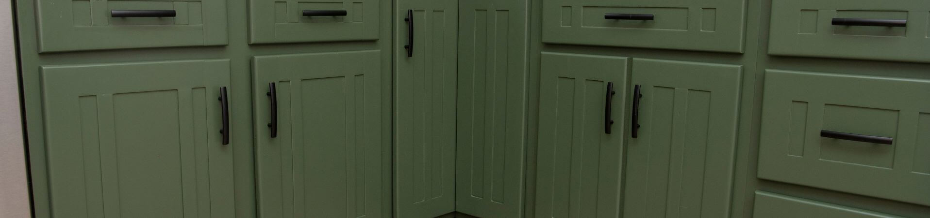 Photo of kitchen with blue and white refinished cabinets