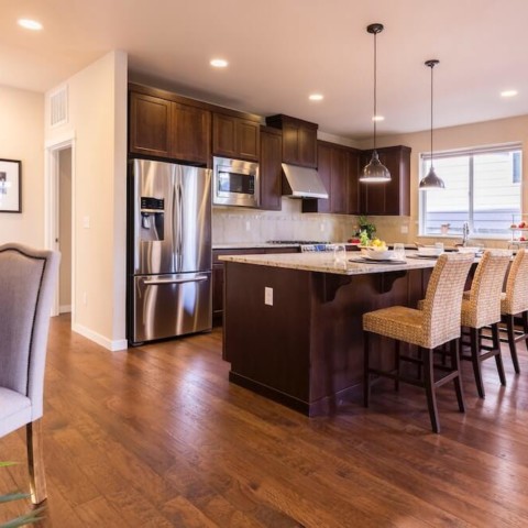 kitchen with dark wooden cabinets