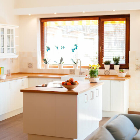 modern kitchen with white cabinets