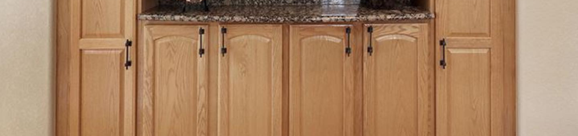 Photo of kitchen with old cabinets before refinishing