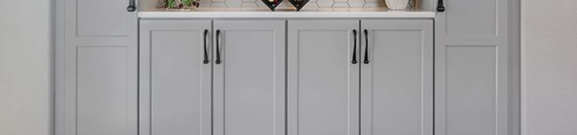 Photo of kitchen with blue and white refinished cabinets